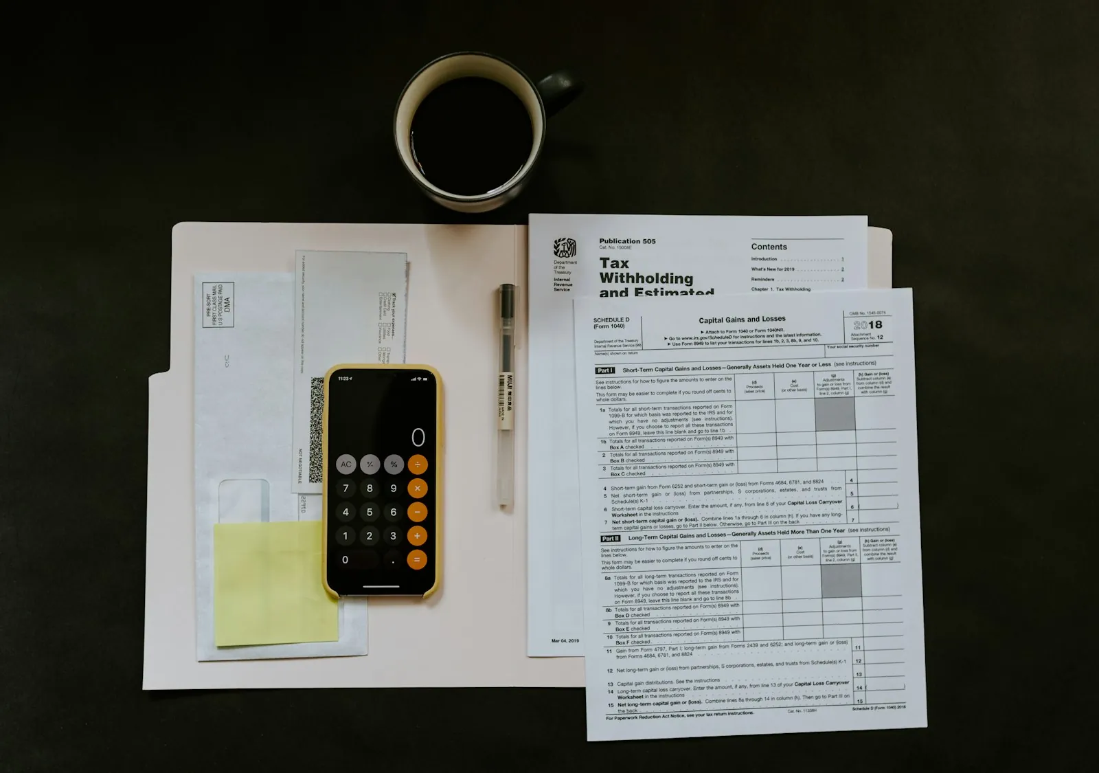 Envelope and paperwork laid out beside a partial California security deposit refund check