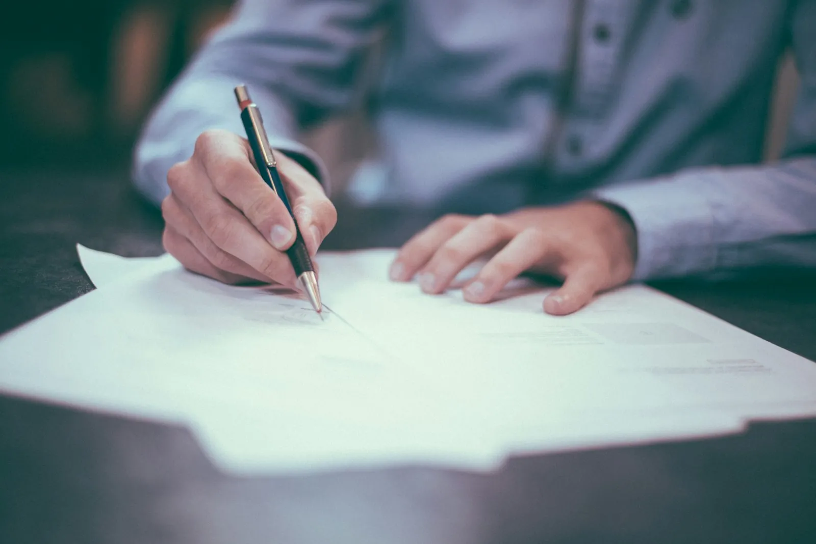 Organized dispute records and demand letter paperwork on a desk